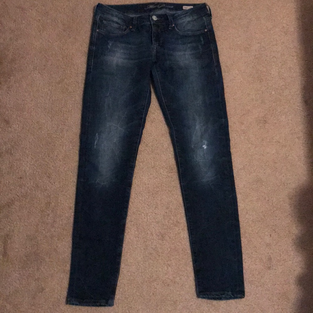 Acid wash dark jeans.